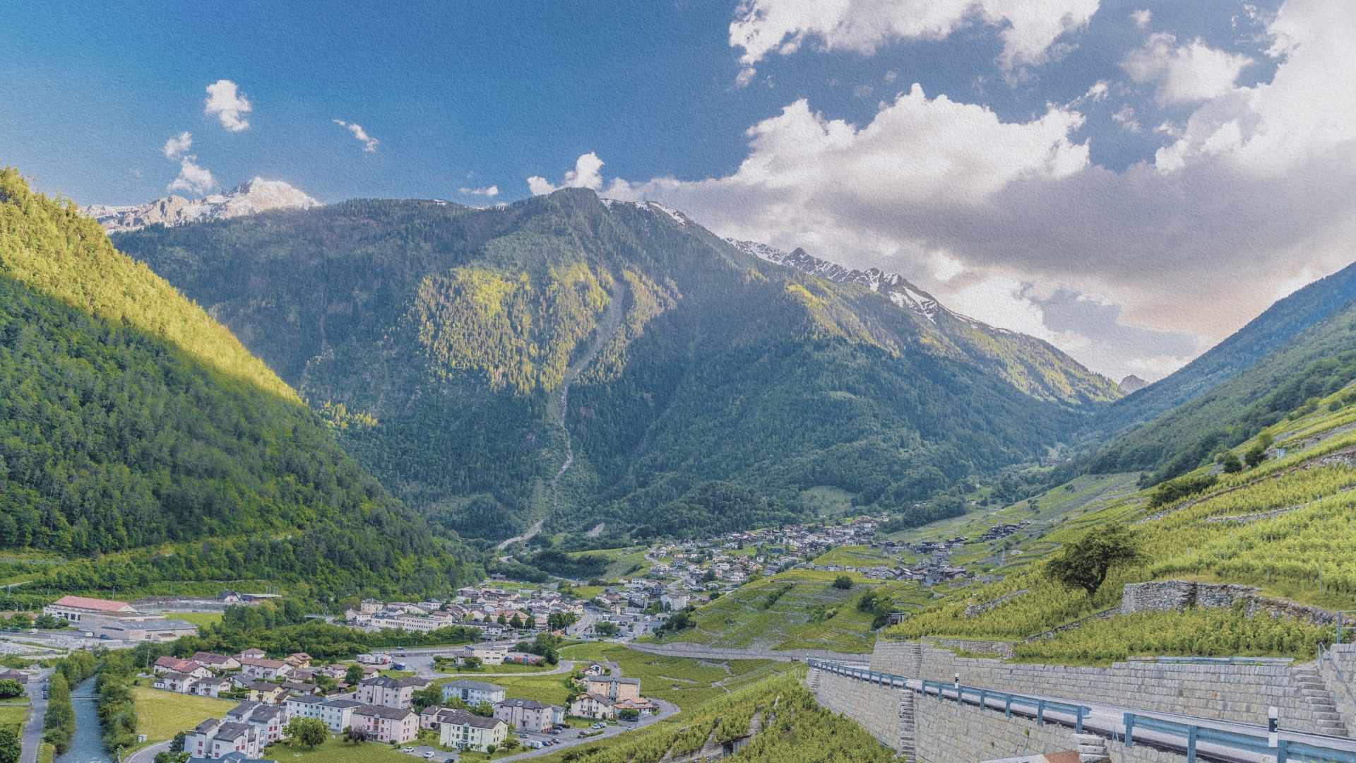 Ville de Martigny dans la vallée du Rhône entourée de montagnes en Valais
